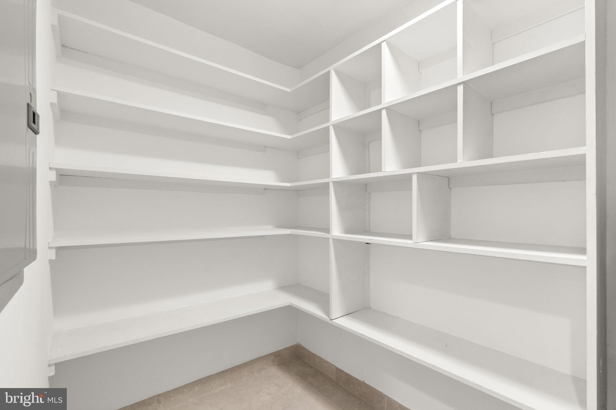 2301 Cherry Street, Unit 5F Philadelphia, PA 19103 - Photo 7 of 26 a view of walk in closet with empty racks
