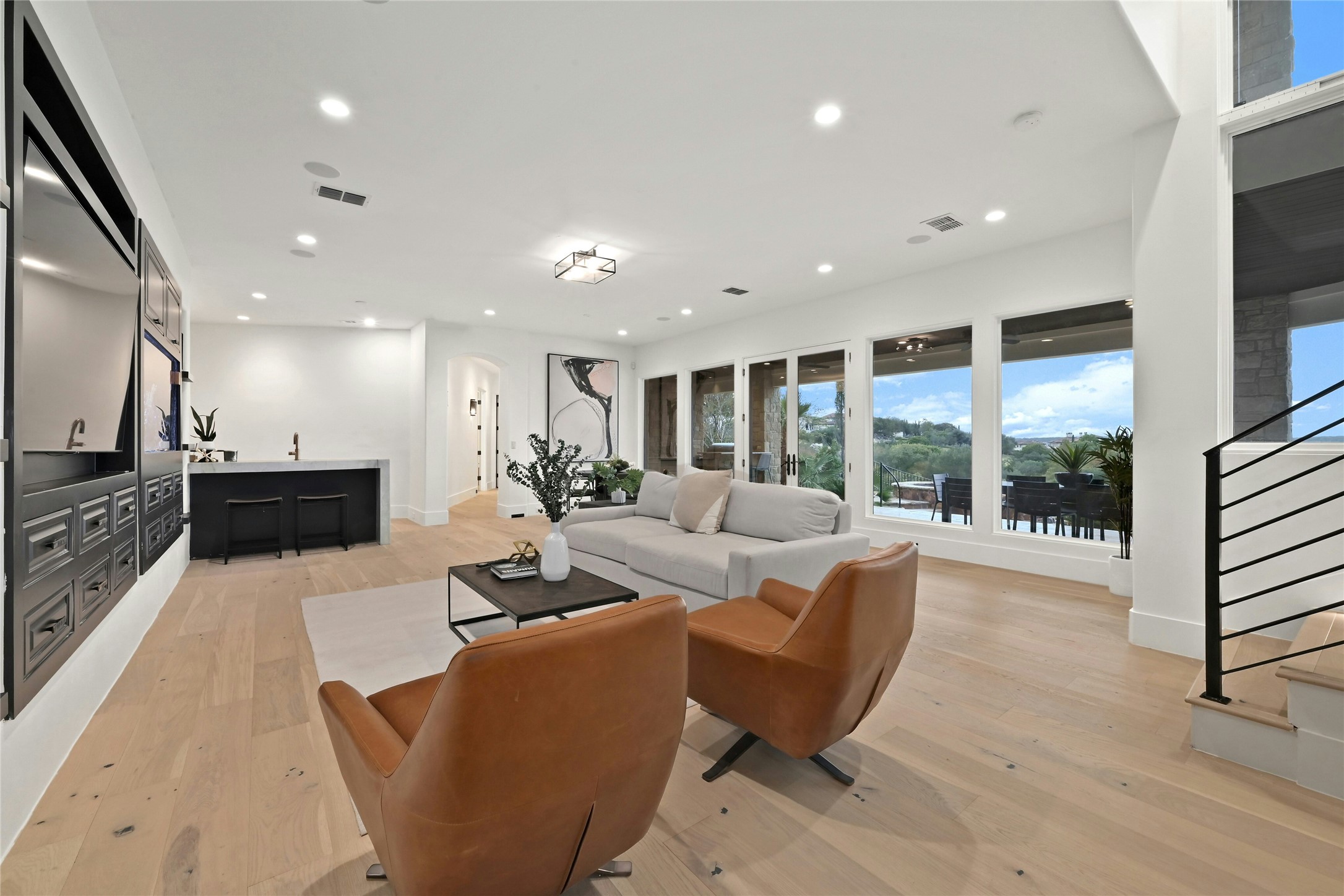 16012 Canard Circle Austin, TX 78734 - Photo 24 of 37 a living room with furniture and a large window