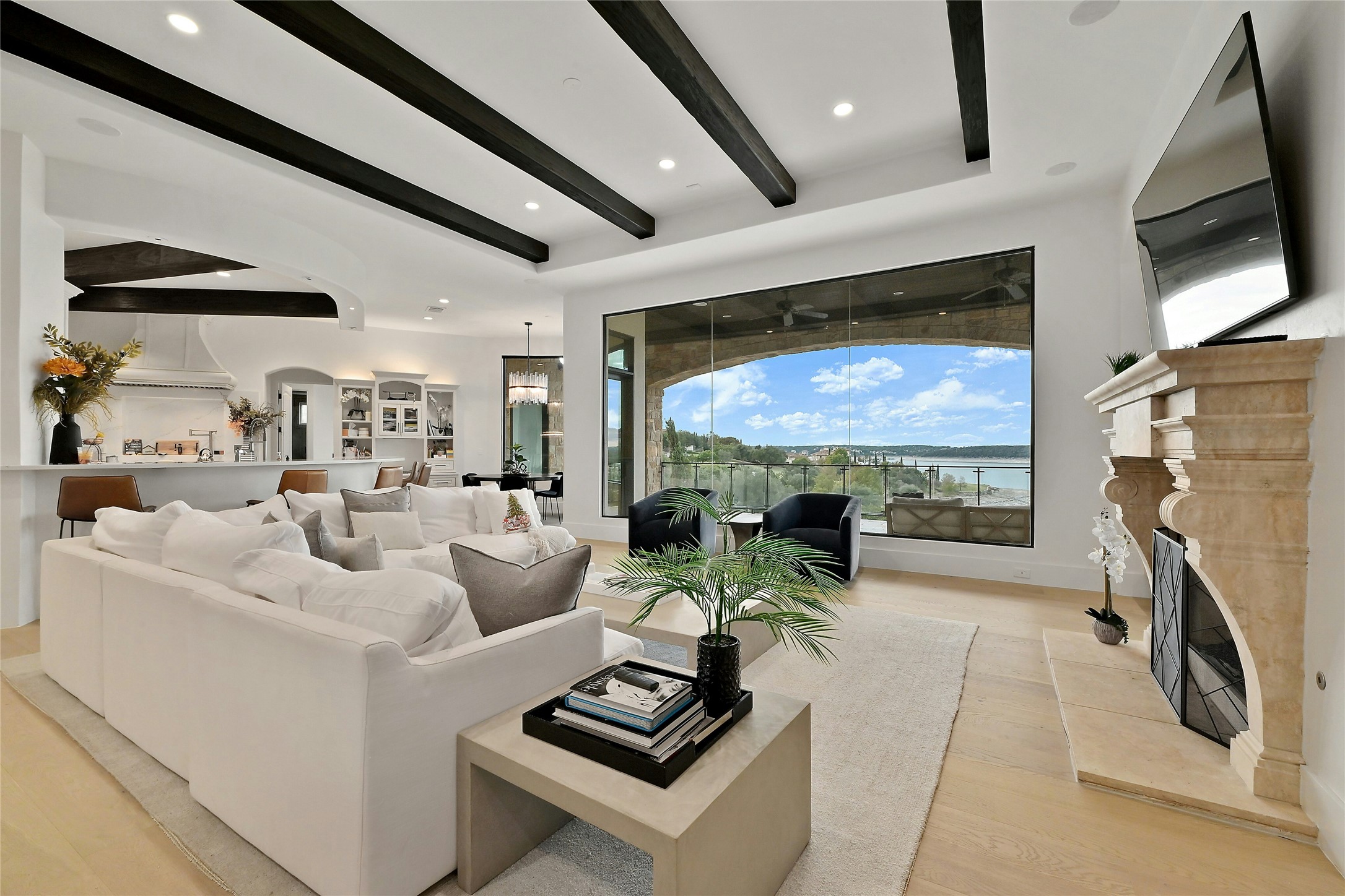 16012 Canard Circle Austin, TX 78734 - Photo 6 of 37 a living room with fireplace furniture and a flat screen tv