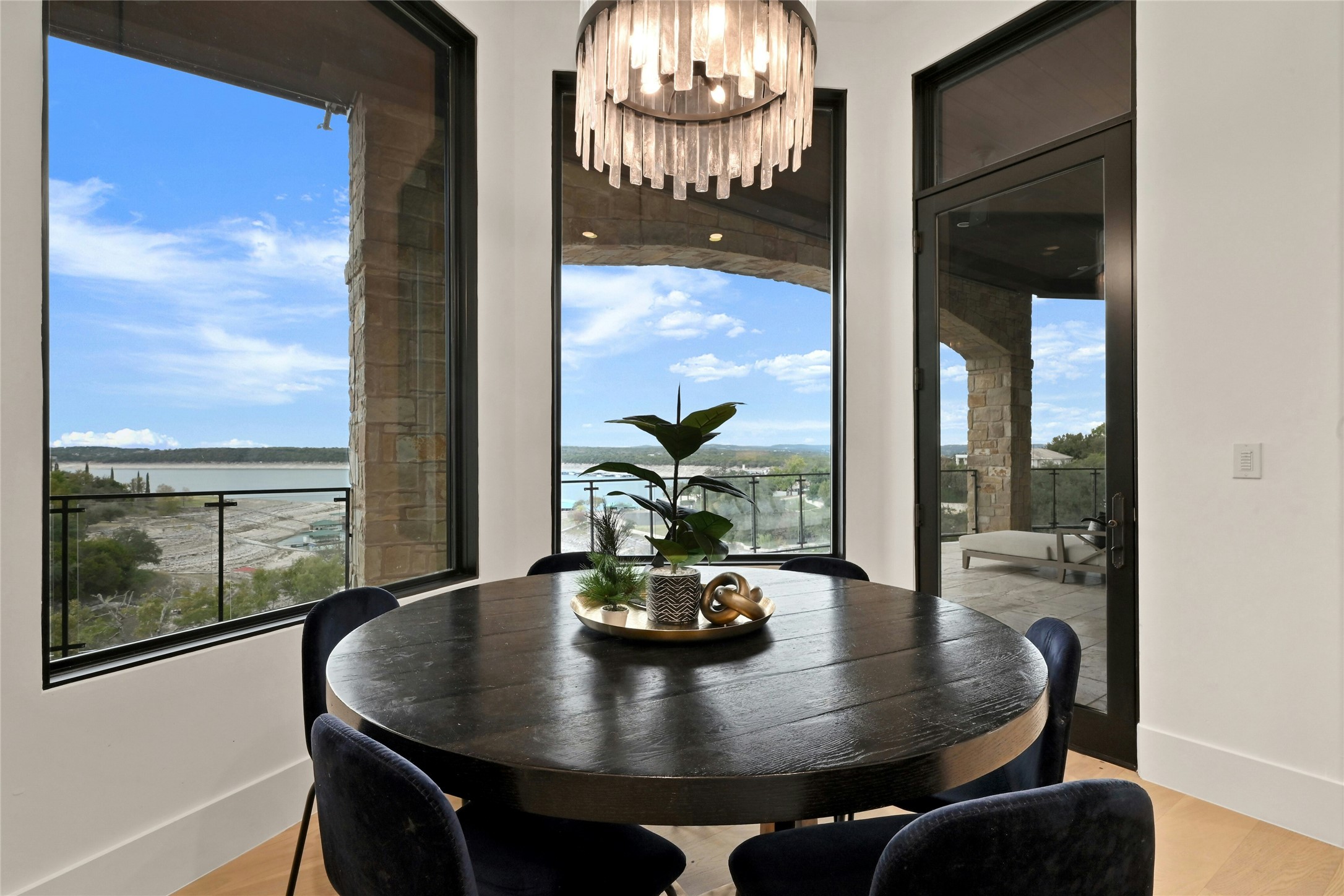 16012 Canard Circle Austin, TX 78734 - Photo 10 of 37 a view of a dining room with furniture window and wooden floor