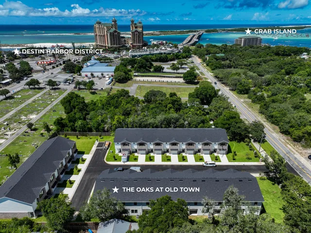 an aerial view of a house with a garden
