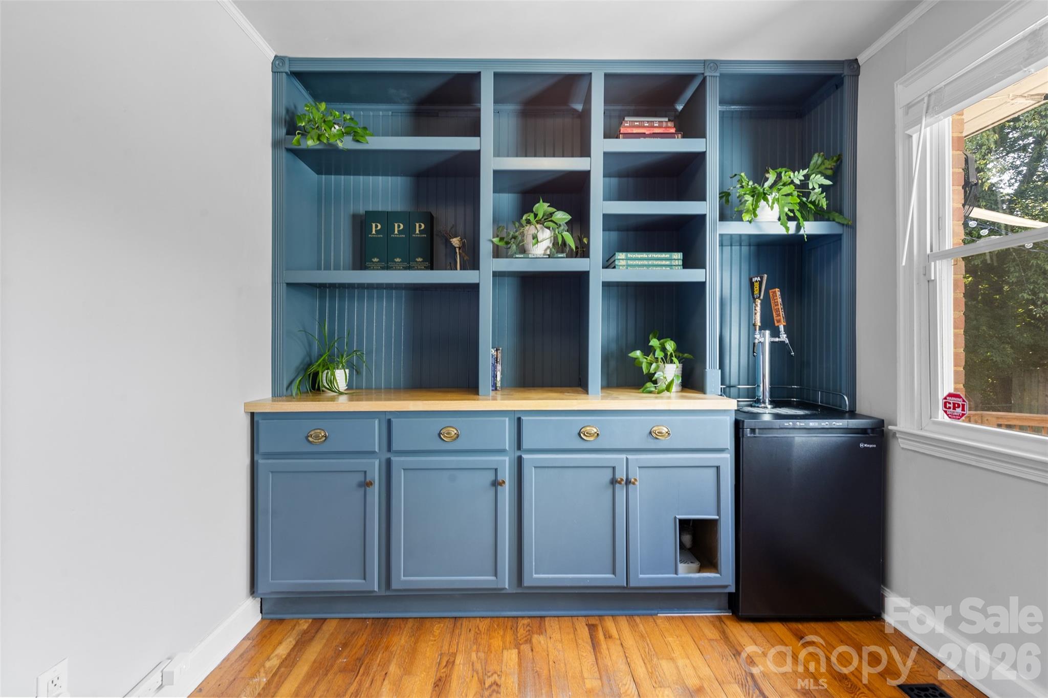 1638 Academy Street Charlotte, NC 28205 - Photo 17 of 30 a kitchen with a sink and a window
