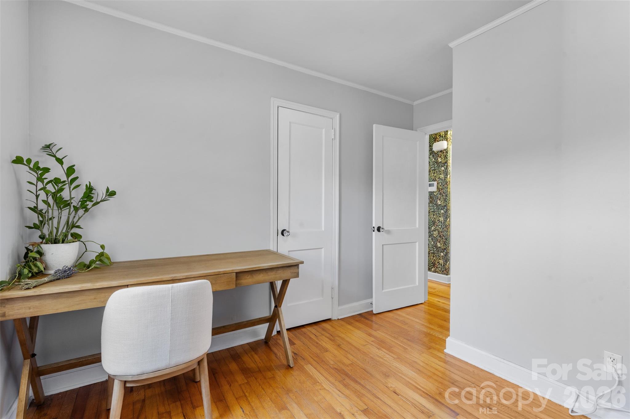 1638 Academy Street Charlotte, NC 28205 - Photo 18 of 30 a view of a room that has a table and chair in it