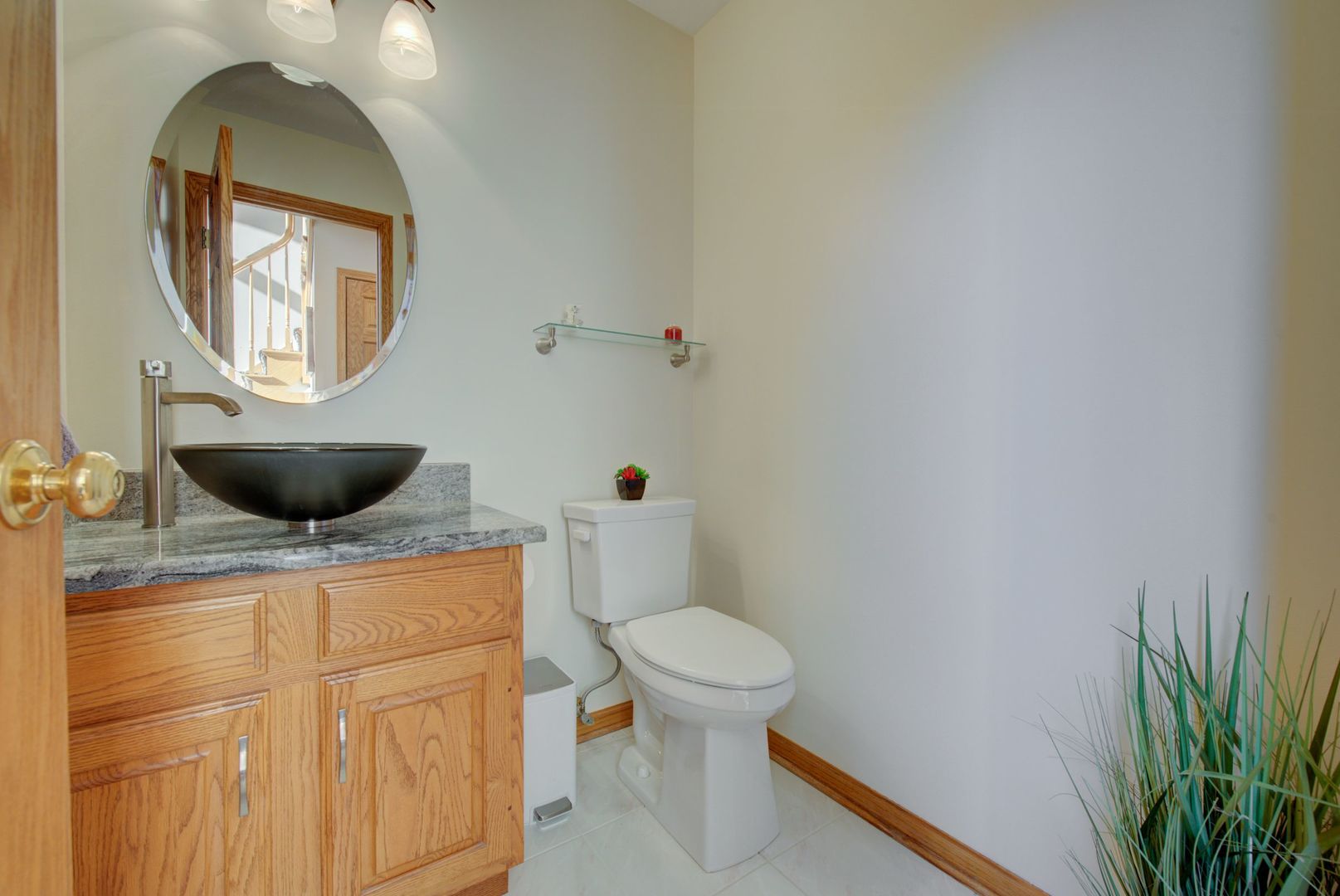 2208 Crystal Circle Crystal Lake, IL 60012 - Photo 22 of 55 a bathroom with a toilet and a mirror