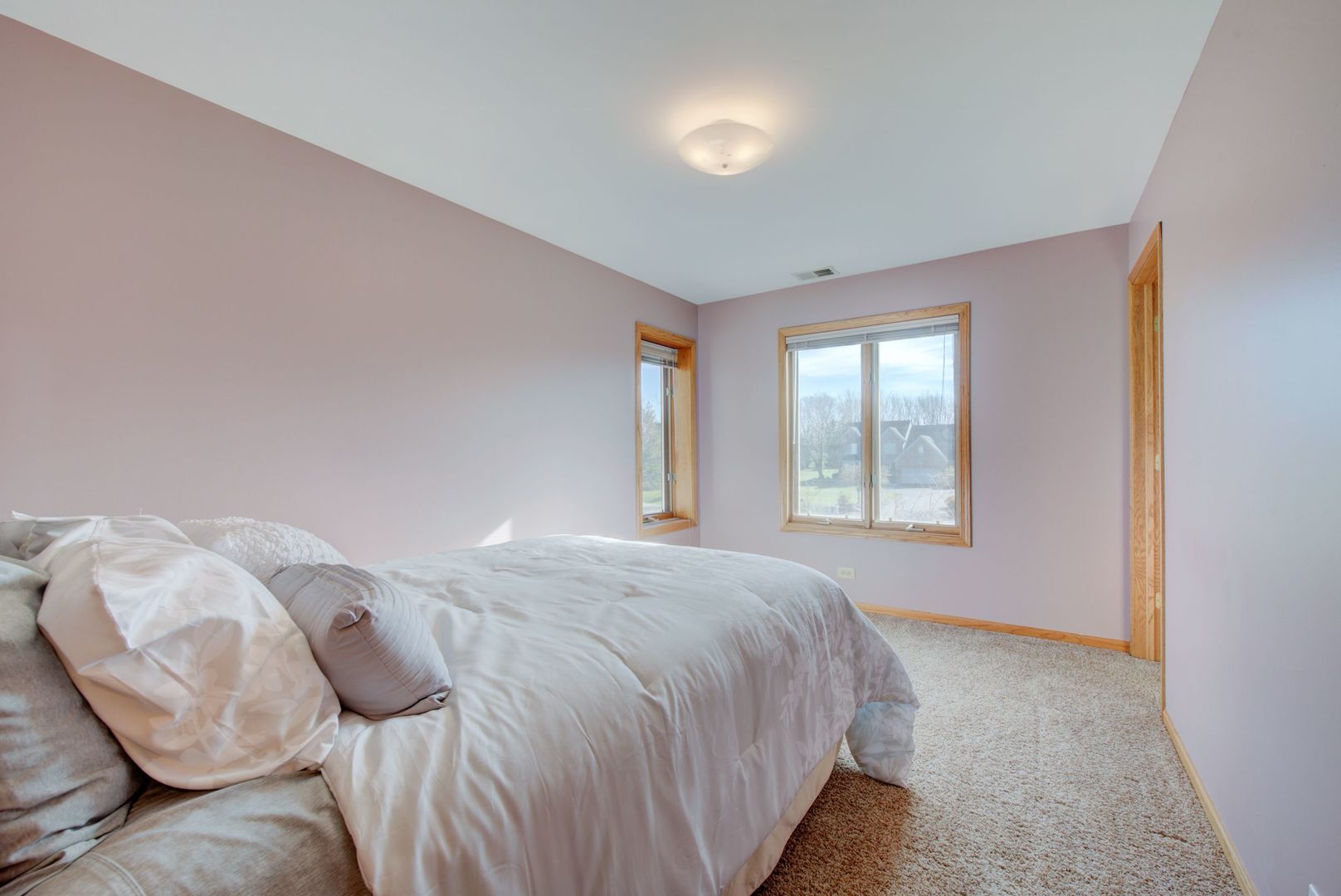 2208 Crystal Circle Crystal Lake, IL 60012 - Photo 32 of 55 a bedroom with a bed and window