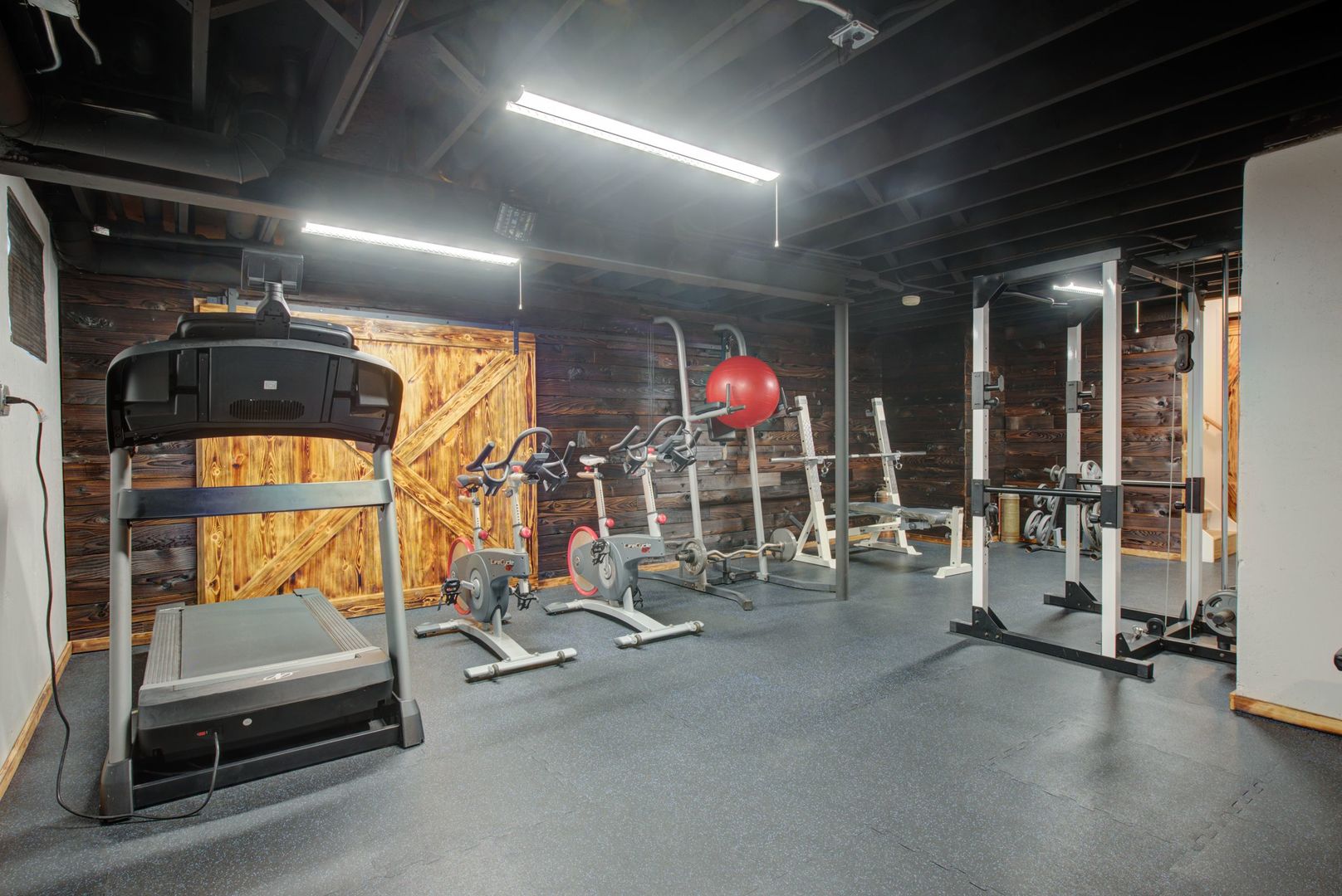 2208 Crystal Circle Crystal Lake, IL 60012 - Photo 37 of 55 a view of a garage with gym equipment