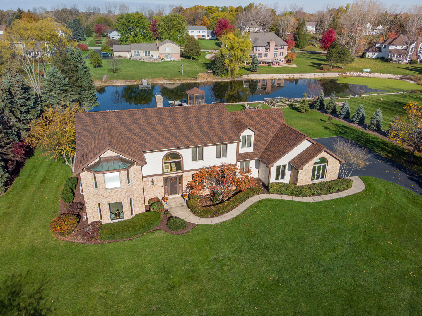 2208 Crystal Circle Crystal Lake, IL 60012 - Photo 4 of 55 an aerial view of a house with a garden