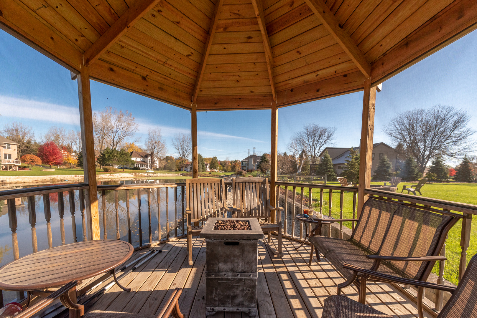 2208 Crystal Circle Crystal Lake, IL 60012 - Photo 45 of 55 a view of a balcony with lake view and wooden floor