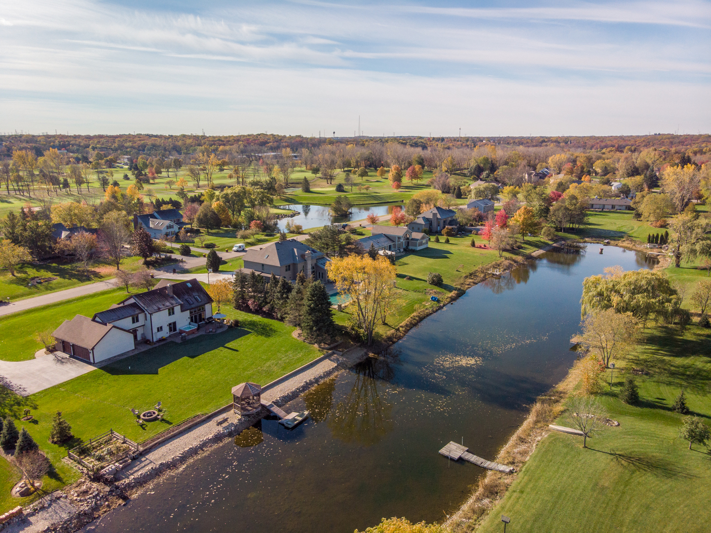 2208 Crystal Circle Crystal Lake, IL 60012 - Photo 52 of 55 an aerial view of a city with lots of residential buildings ocean and mountain view in back