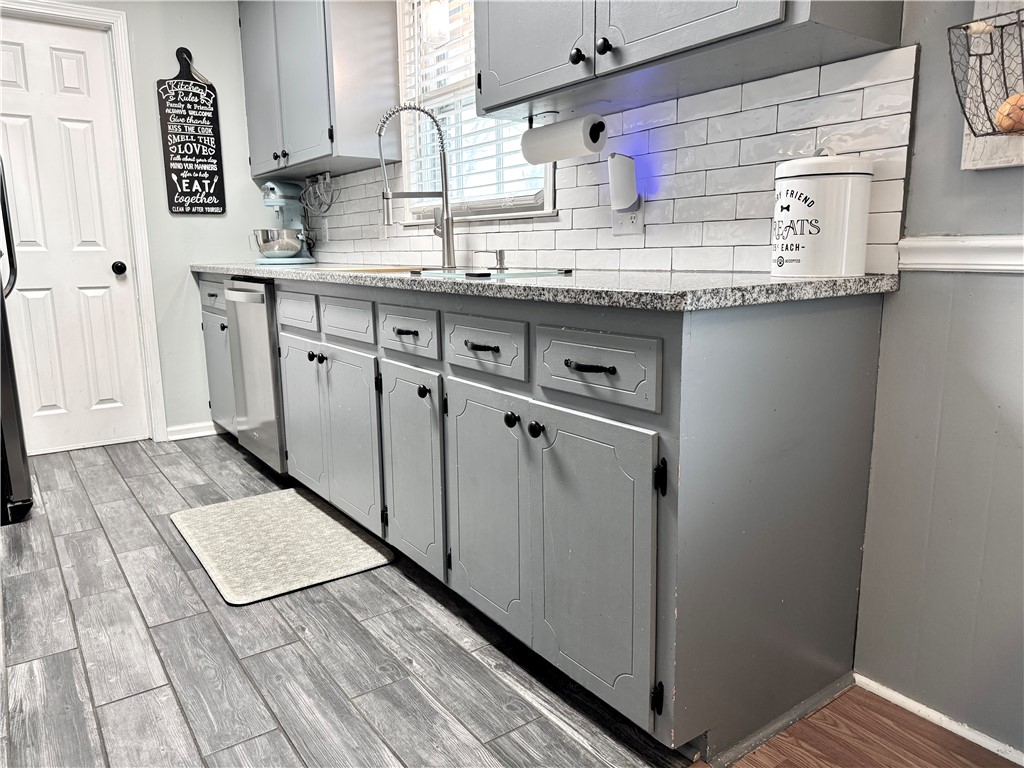 104 Lark Lane Anderson, SC 29625 - Photo 16 of 49 This modern kitchen features durable flooring and sleek, functional appliances for everyday living.