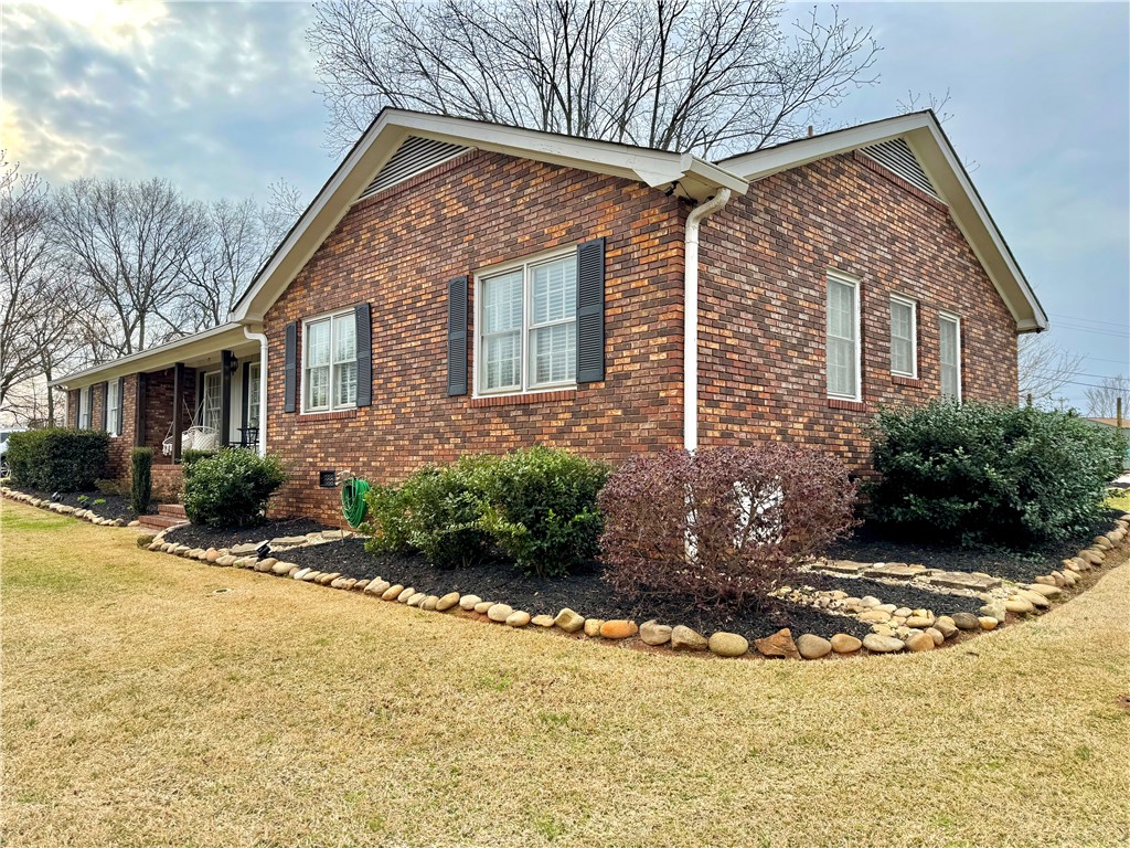 104 Lark Lane Anderson, SC 29625 - Photo 2 of 49 This brick residence features well maintained landscaping.