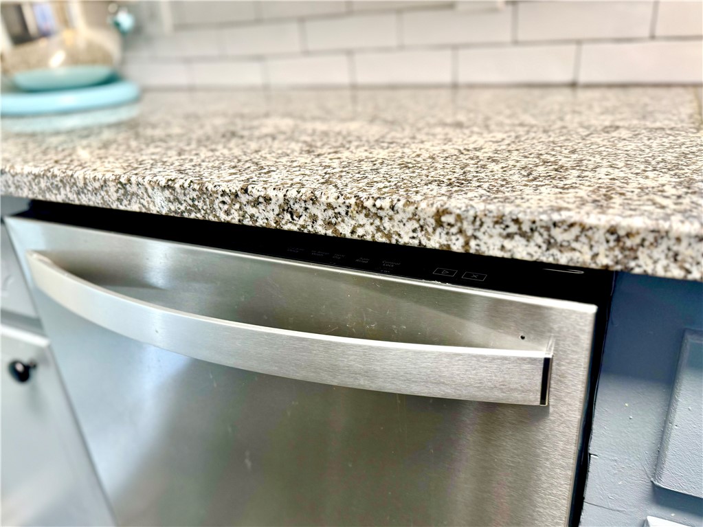 104 Lark Lane Anderson, SC 29625 - Photo 21 of 49 This modern kitchen features a stainless steel dishwasher.