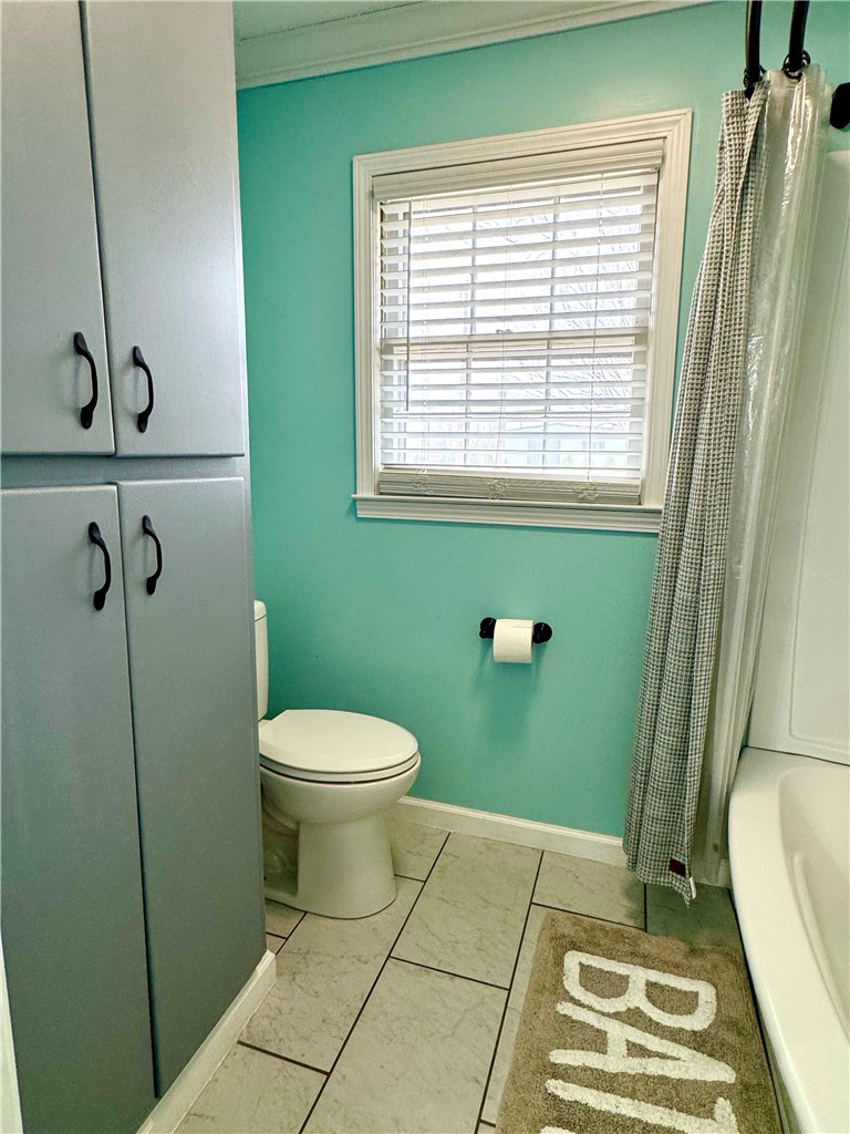 104 Lark Lane Anderson, SC 29625 - Photo 25 of 49 The hall bathroom features practical cabinet storage and durable tile flooring.