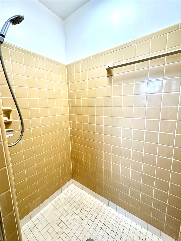 104 Lark Lane Anderson, SC 29625 - Photo 31 of 49 The primary bedroom shower is spacious and durable with updated exhaust fan and lighting.