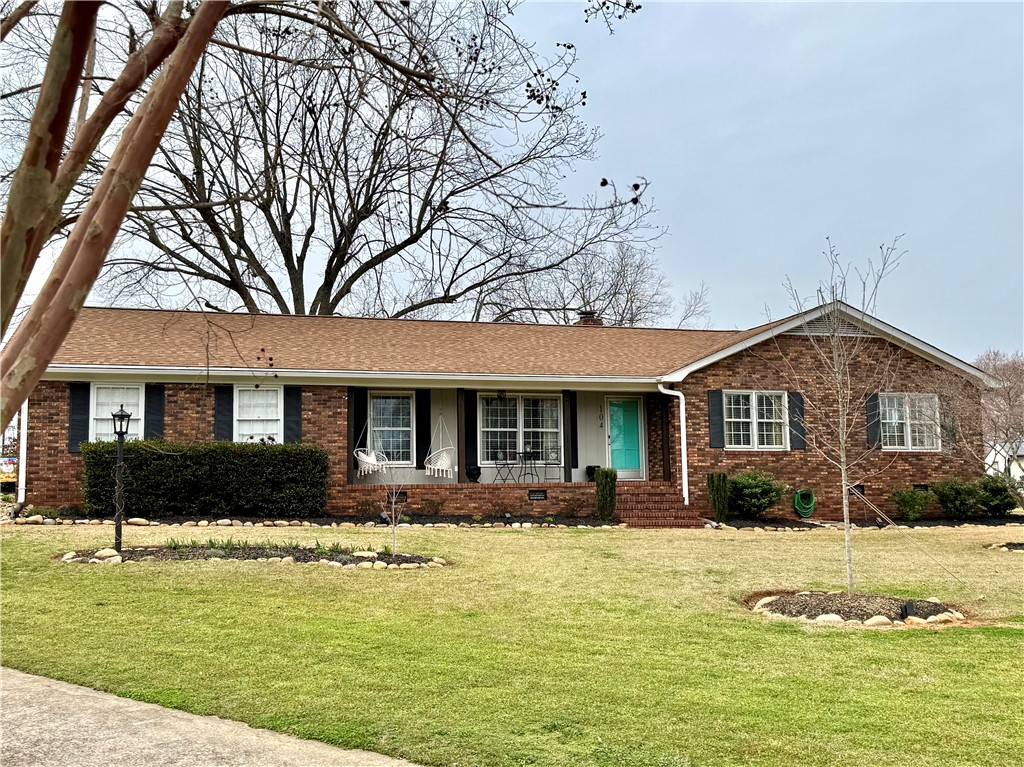 104 Lark Lane Anderson, SC 29625 - Photo 37 of 49 This charming brick ranch home features a well-maintained lawn.