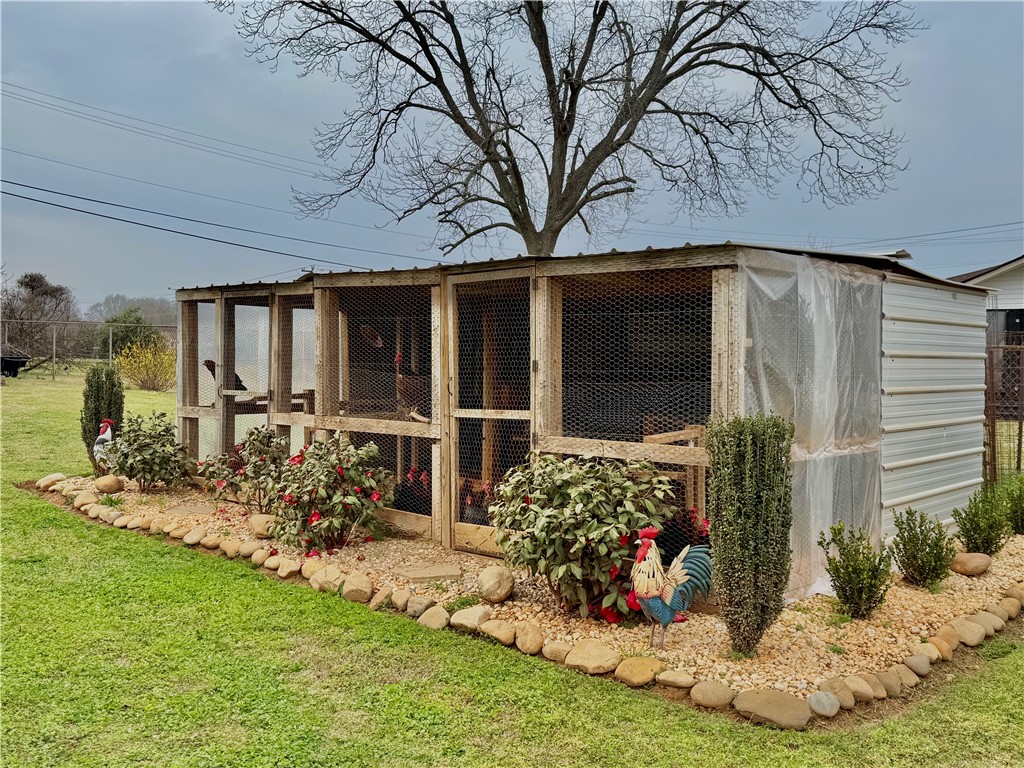 104 Lark Lane Anderson, SC 29625 - Photo 42 of 49 This spacious poultry enclosure provides ample room for animals.