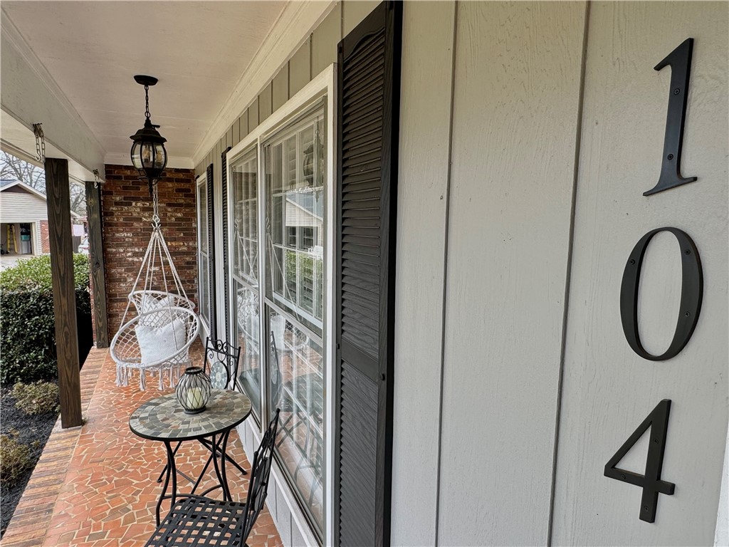 104 Lark Lane Anderson, SC 29625 - Photo 6 of 49 This charming residence features a welcoming front porch with clay ceramic tile flooring, perfect for enjoying peaceful outdoor moments.