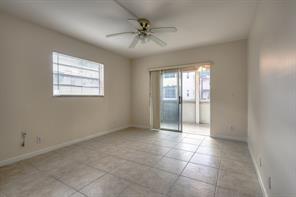 641 Normandy Lane, Unit N Delray Beach, FL 33484 - Photo 11 of 15 a view of an empty room with a window