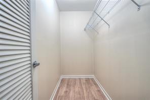 641 Normandy Lane, Unit N Delray Beach, FL 33484 - Photo 14 of 15 a view of a room with racks on the wall
