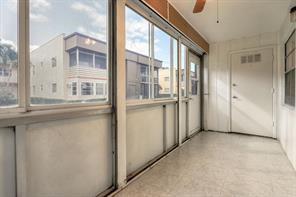 641 Normandy Lane, Unit N Delray Beach, FL 33484 - Photo 15 of 15 a view of empty room with a window