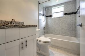 641 Normandy Lane, Unit N Delray Beach, FL 33484 - Photo 9 of 15 a bathroom with a bathtub and a shower