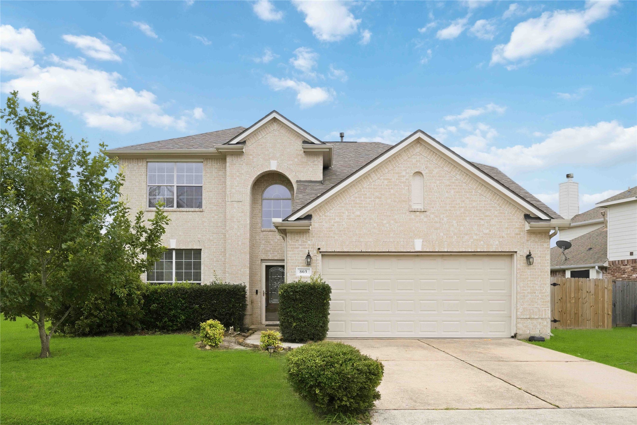 803 Northridge Terrace Lane Spring, TX 77373 - Photo 1 of 42 a view of a white house next to a yard with big trees