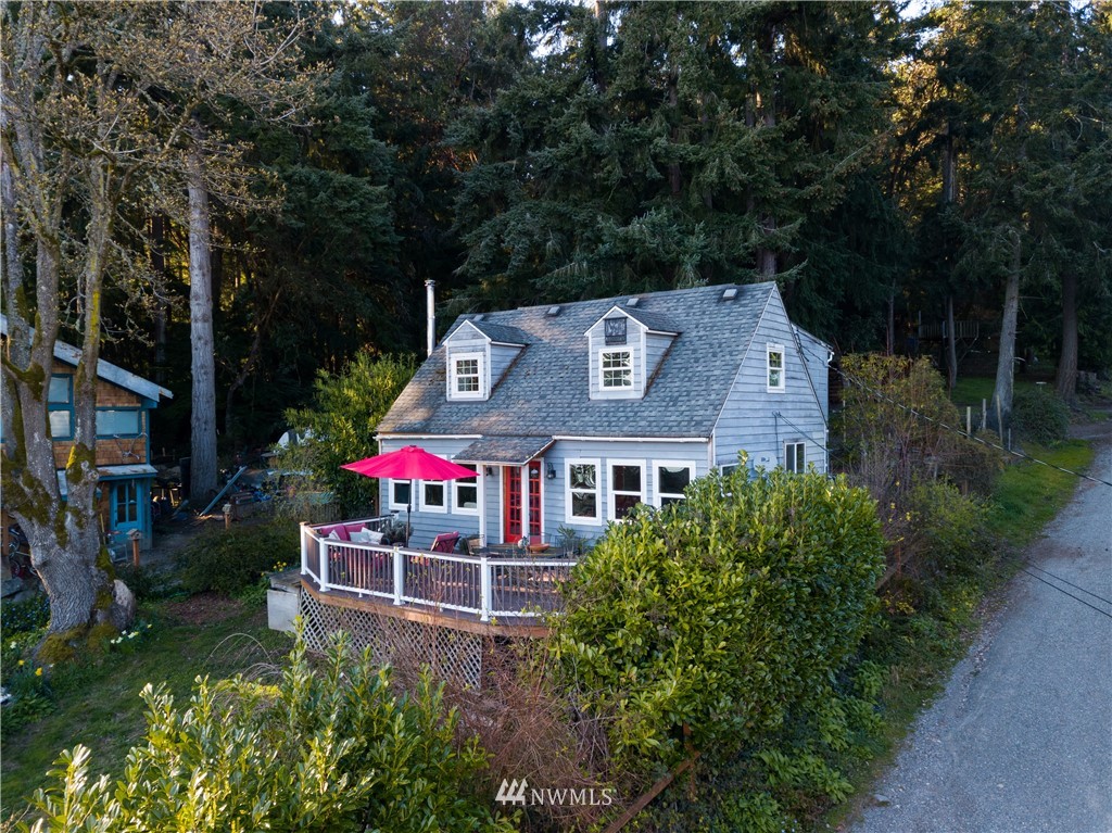 13909 Southwest Pohl Road Vashon, WA 98070 - Photo 1 of 24 an aerial view of a house