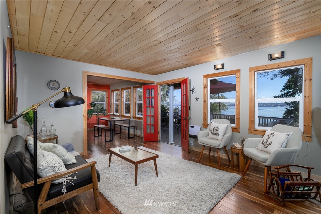 13909 Southwest Pohl Road Vashon, WA 98070 - Photo 7 of 24 a living room with furniture a rug and a window