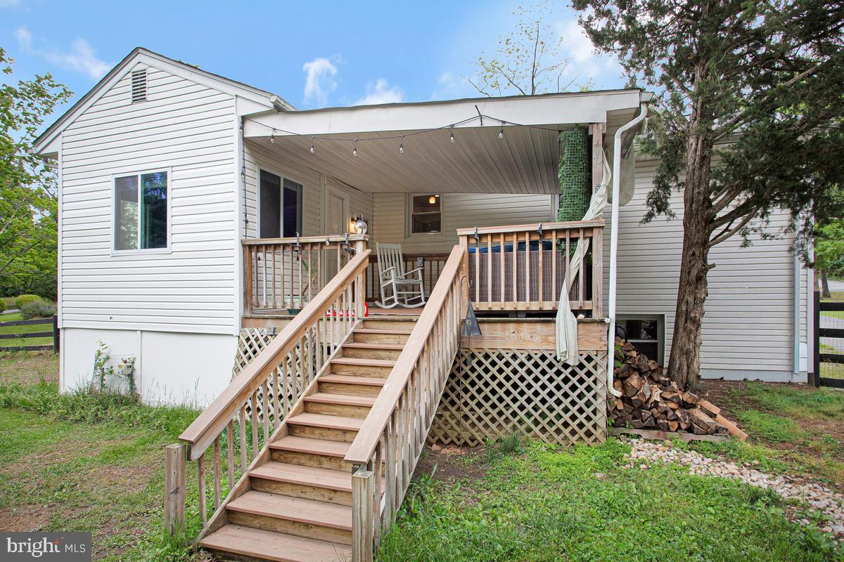 976 Shore Acres Road Arnold, MD 21012 - Photo 30 of 40 a view of a house with a deck