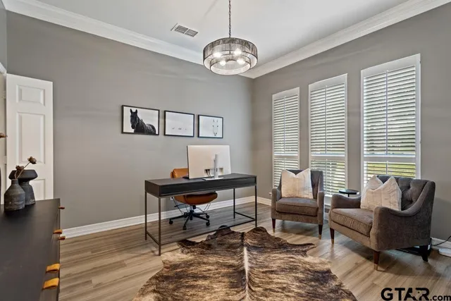 a view of a dining room with furniture