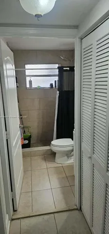a view of bathroom with a sink and toilet