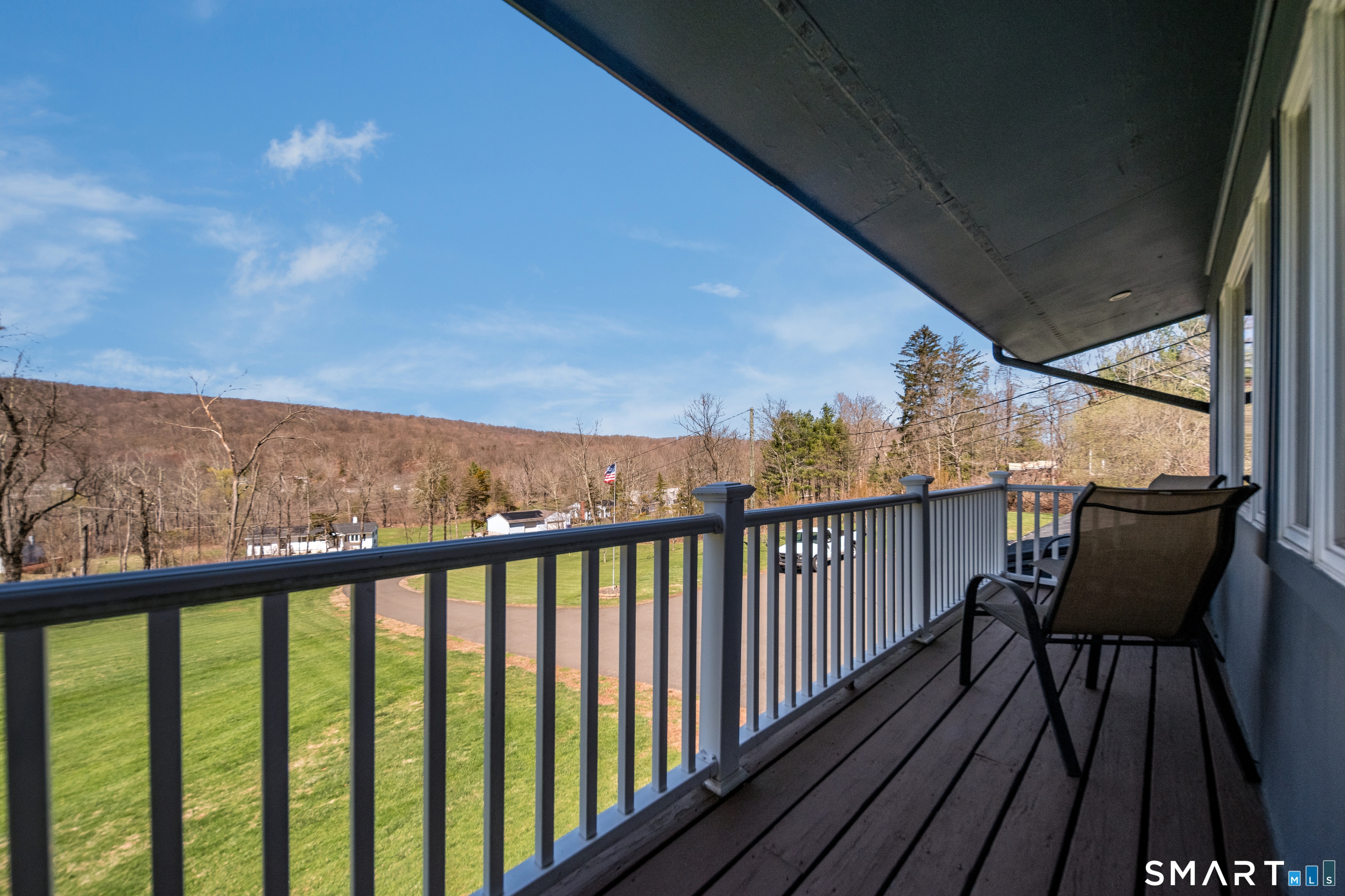 408 R Stage Coach Road Durham, CT 06422 - Photo 12 of 40 a view of a balcony with wooden floor and outdoor seating