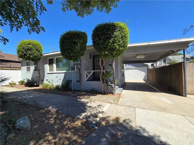 a view of a backyard of the house