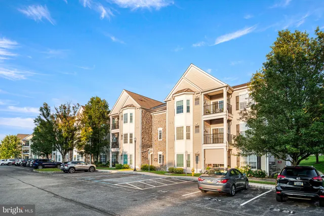 a view of a street with cars on road