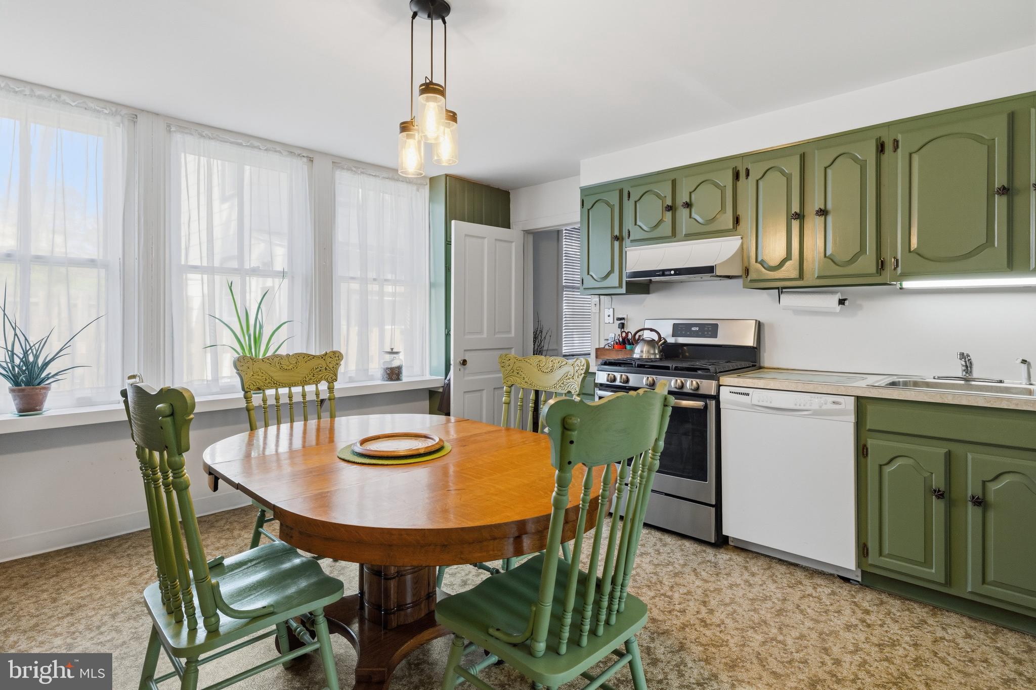 1268 Ashbourne Road Elkins Park, PA 19027 - Photo 13 of 46 a view of a dining room with furniture window and outside view