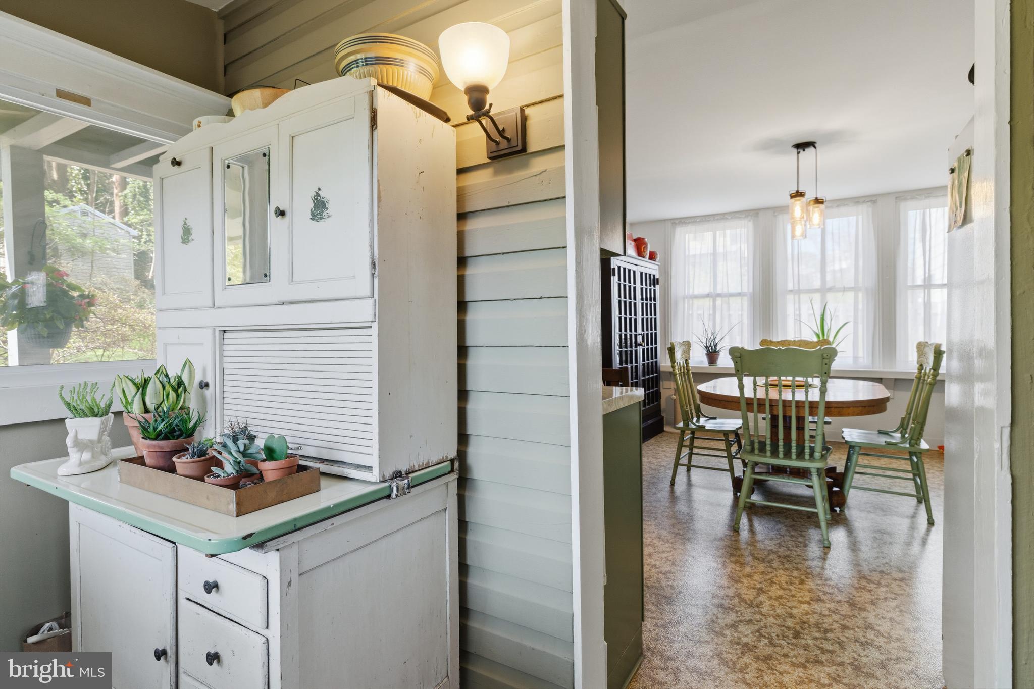 1268 Ashbourne Road Elkins Park, PA 19027 - Photo 15 of 46 a dining room with furniture and wooden floor
