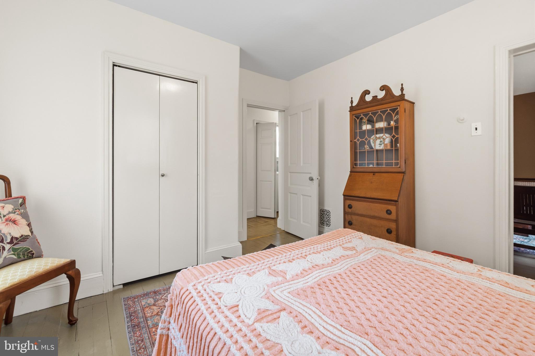 1268 Ashbourne Road Elkins Park, PA 19027 - Photo 22 of 46 a bedroom with a bed and a dresser