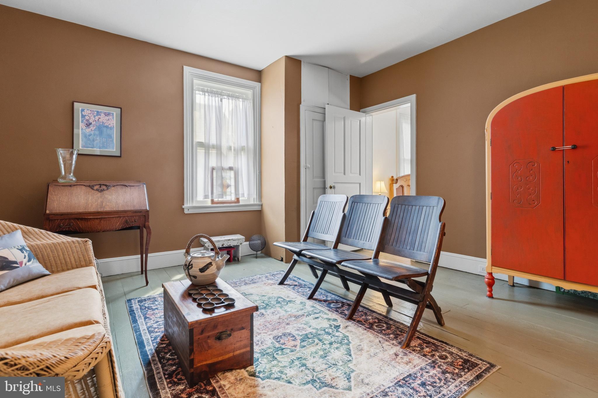1268 Ashbourne Road Elkins Park, PA 19027 - Photo 24 of 46 a living room with furniture and a window