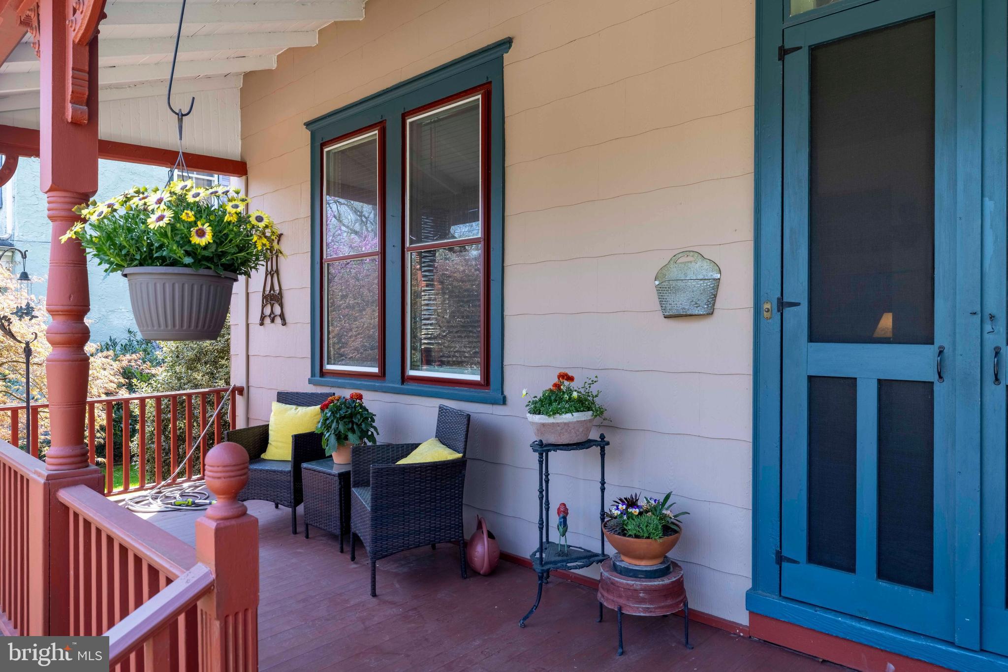 1268 Ashbourne Road Elkins Park, PA 19027 - Photo 3 of 46 a view of a porch with chairs and potted plants
