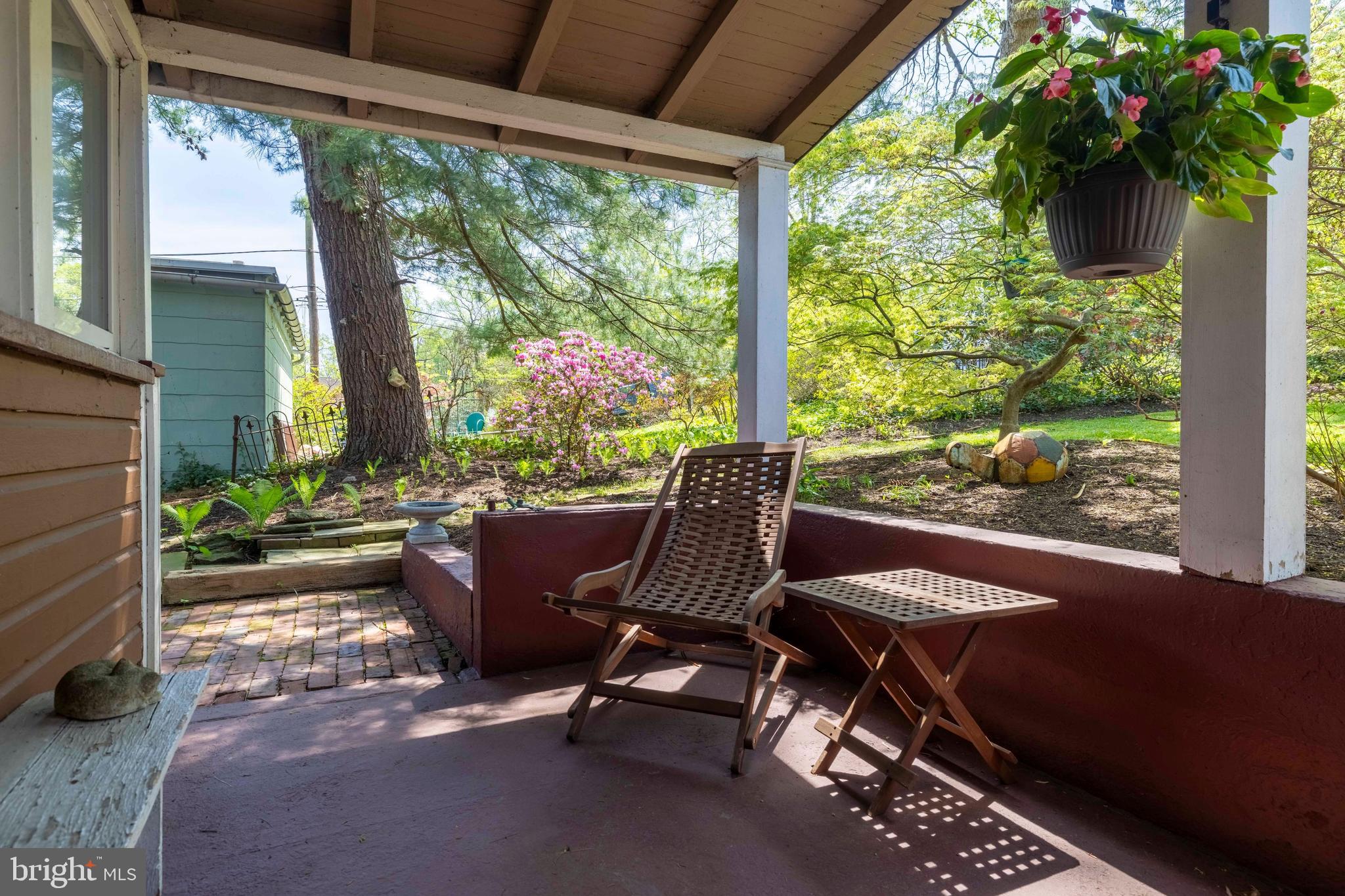 1268 Ashbourne Road Elkins Park, PA 19027 - Photo 31 of 46 a view of a porch with furniture and a yard