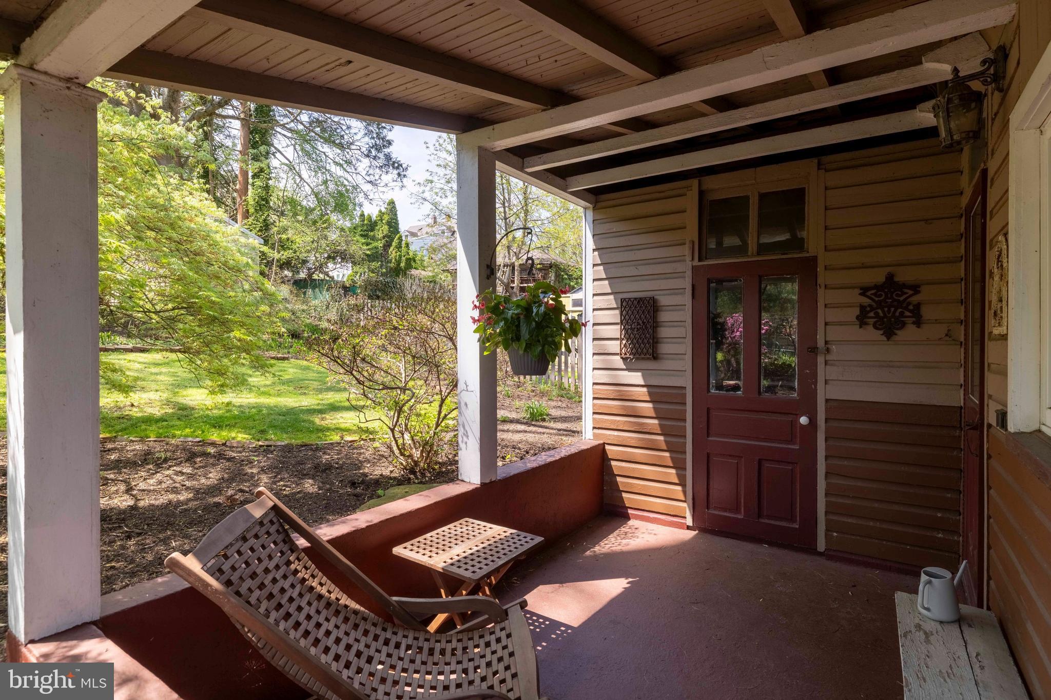 1268 Ashbourne Road Elkins Park, PA 19027 - Photo 32 of 46 a view of a porch with furniture and floor to ceiling window