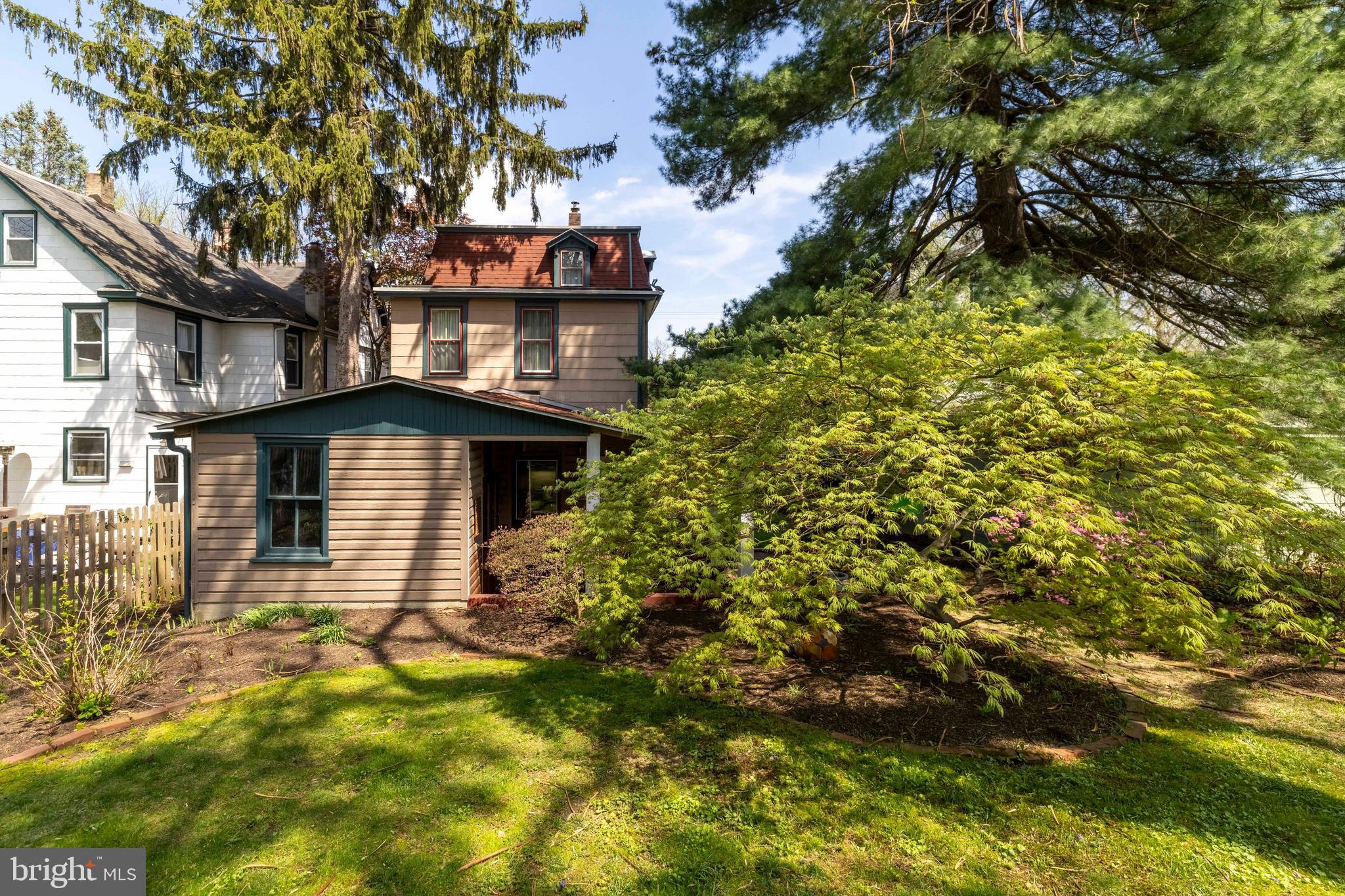 1268 Ashbourne Road Elkins Park, PA 19027 - Photo 39 of 46 a front view of a house with a yard