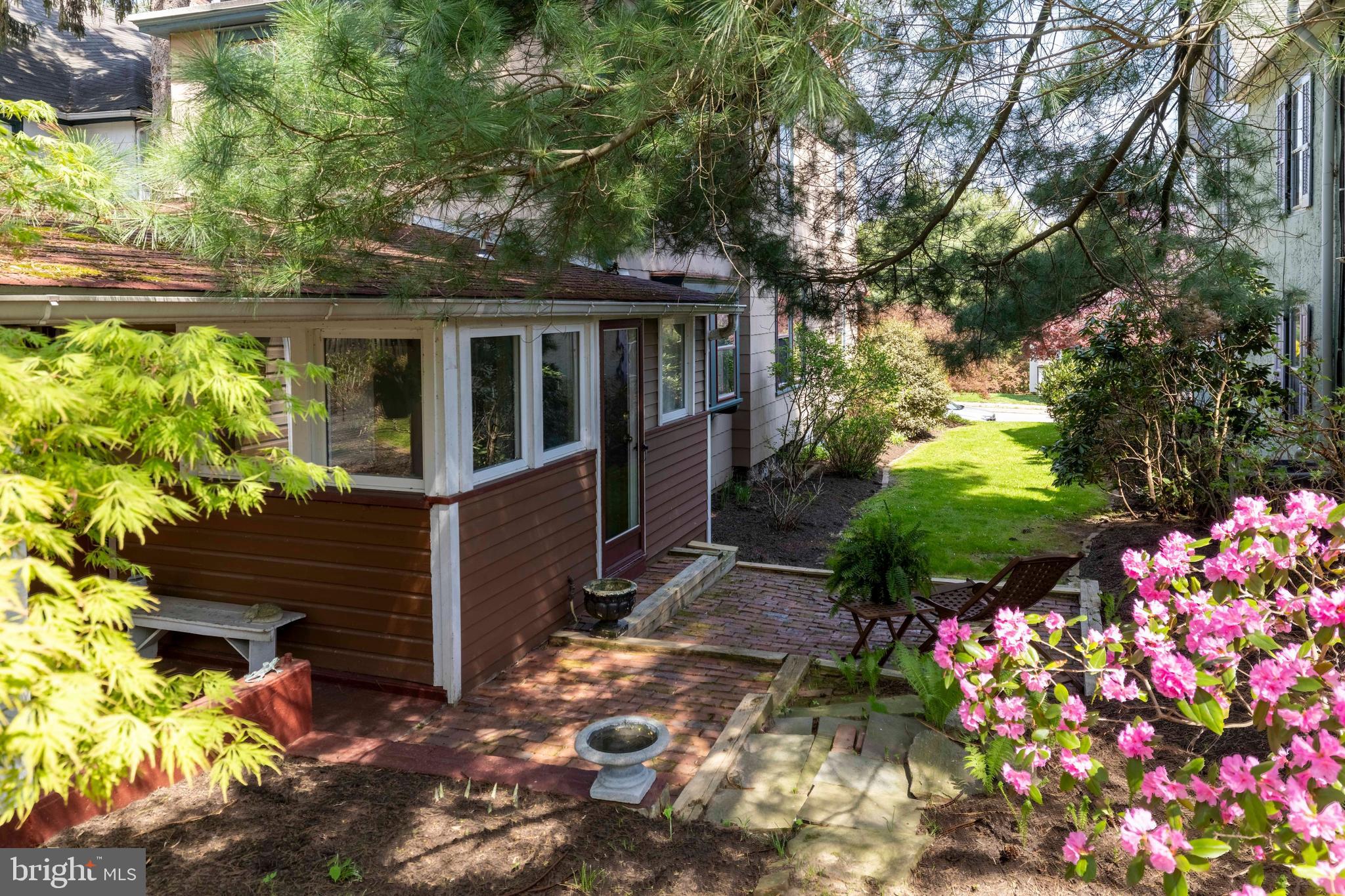1268 Ashbourne Road Elkins Park, PA 19027 - Photo 41 of 46 a front view of a house with a yard