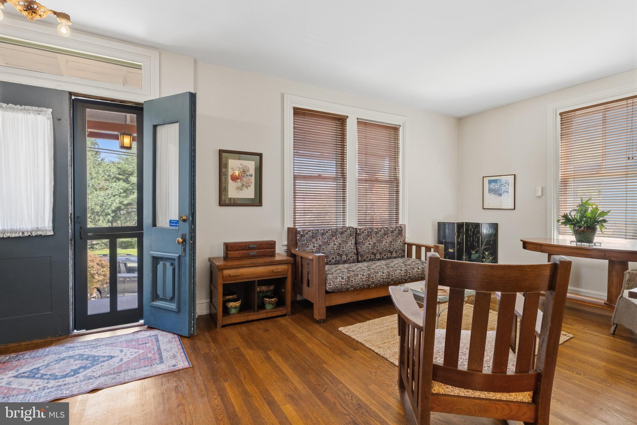 1268 Ashbourne Road Elkins Park, PA 19027 - Photo 6 of 46 a living room with furniture and wooden floor