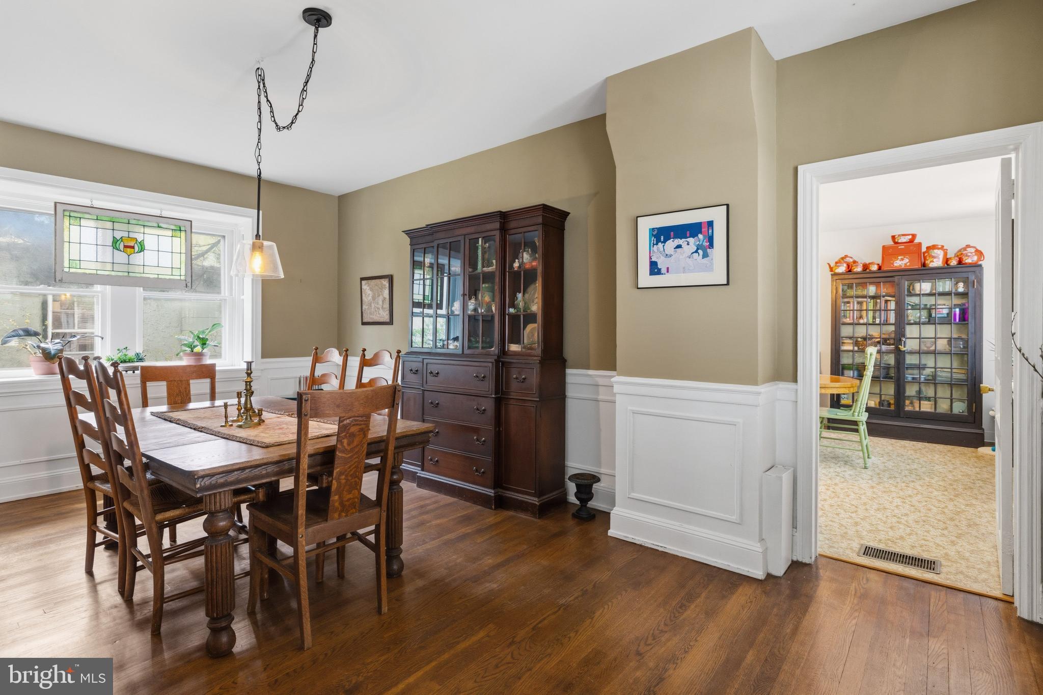1268 Ashbourne Road Elkins Park, PA 19027 - Photo 9 of 46 a view of a dining room with furniture window and wooden floor