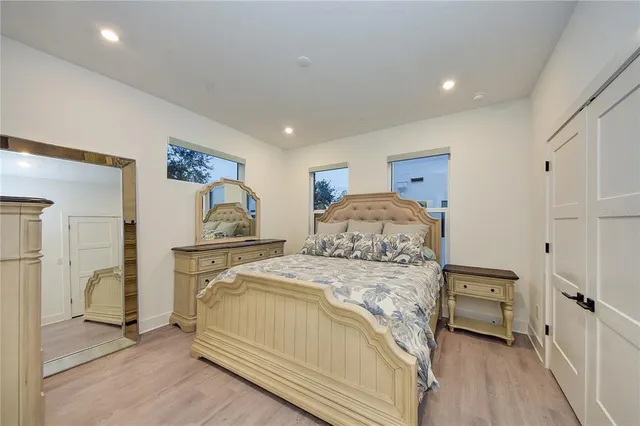 a bathroom with double sink and a mirror