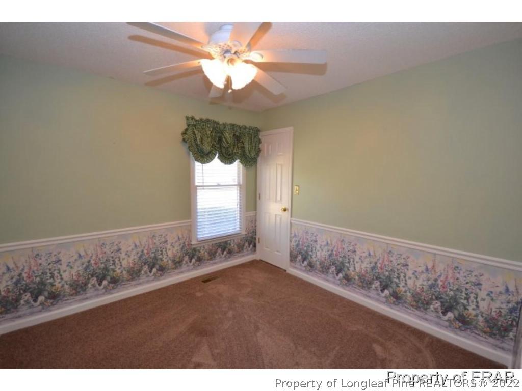 511 Berwick Drive Raeford, NC 28376 - Photo 13 of 26 a view of an empty room with a window