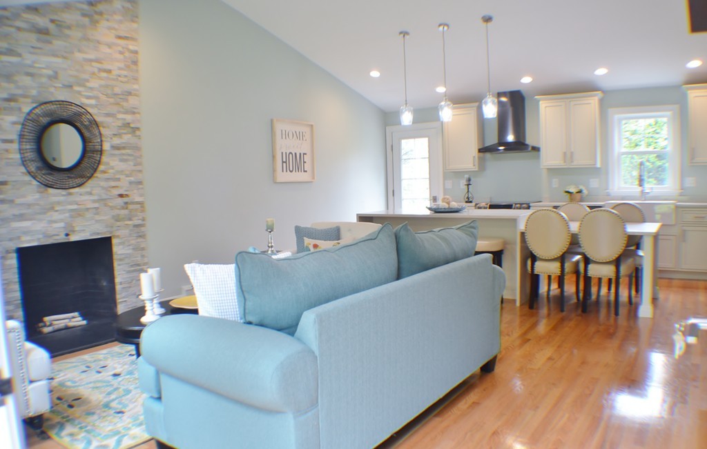 234 Ridge Street Winchester, MA 01890 - Photo 6 of 26 a living room with furniture and a fireplace