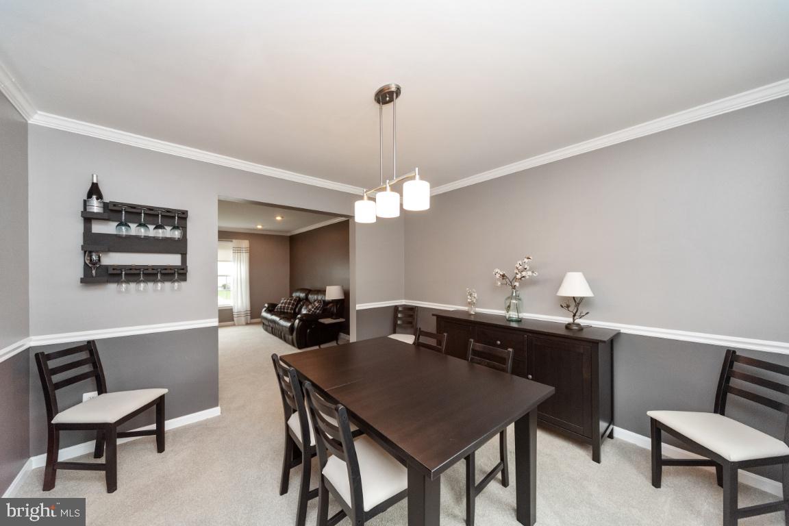 8117 Timberbrooke Road Baltimore, MD 21237 - Photo 11 of 35 Separate dining room for entertaining!