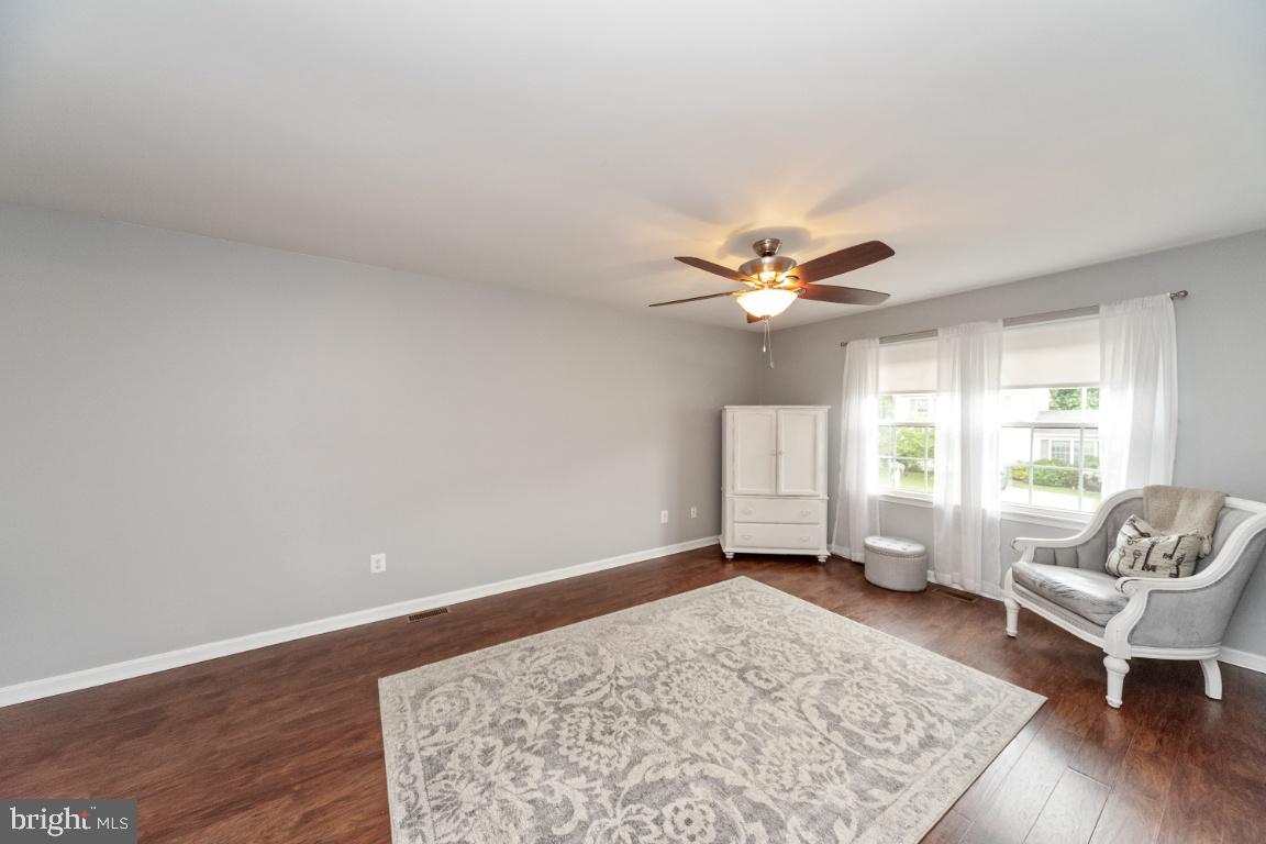 8117 Timberbrooke Road Baltimore, MD 21237 - Photo 15 of 35 Primary suite good lighting and ceiling fan